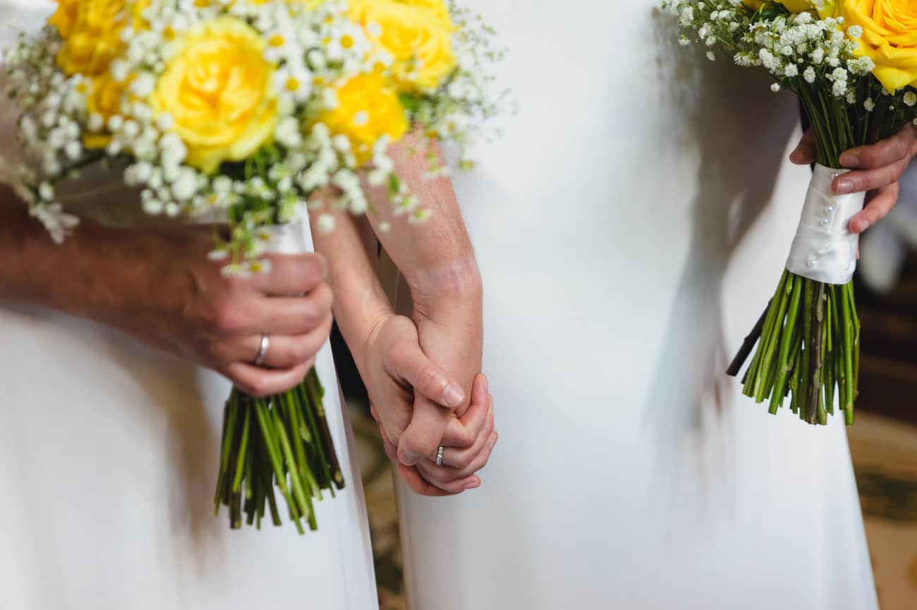 Same-sex wedding photography 2 brides at Thornbury Castle