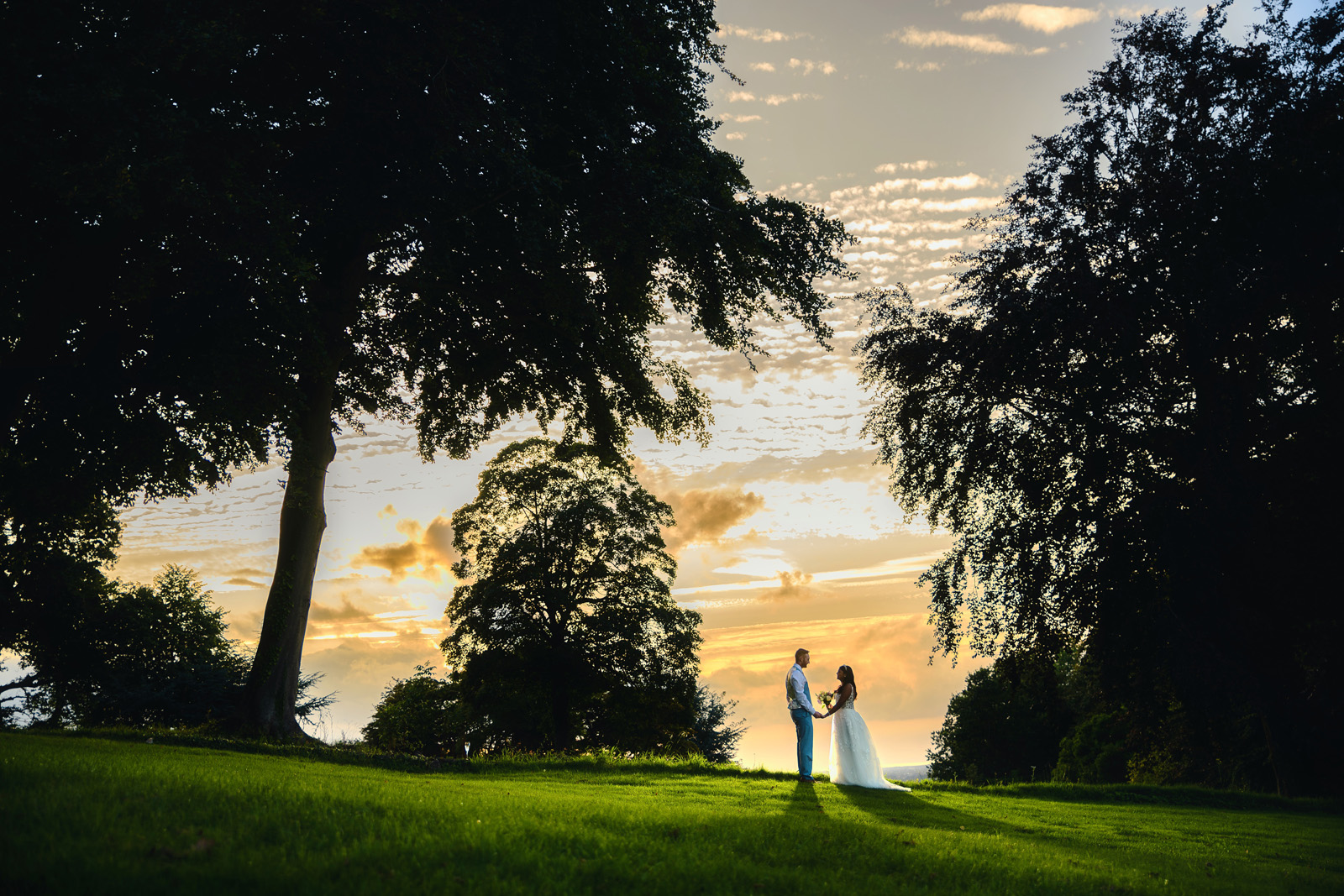 Sunset Bride and Groom wedding photography at Coombe Lodge